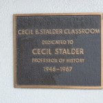 A plaque dedicated to Cecil Stalder, history professor on one of the doors of the quadrangle classrooms.