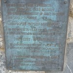 The original dedication plaque for the band shell from 1920.