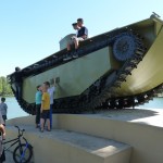 The Carlsen kids figuring out how to climb on top of the tank.