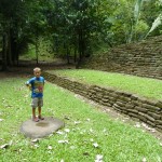 AJ on the start game mark of the ball court.