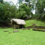 A little hut protects the stella of a royal tomb.