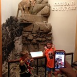 AJ and a friend imitate the Cougar roar.