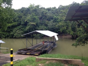 The ferry that takes people across the Mopan river.
