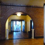 A view towards the Florence ballroom shows a classic brick archway.