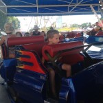 AJ did a reading program where he had to read five books and the fair gave him three free ride tokens.