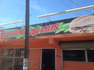 Tortas San Luis is located on a dirt road on Calle Cuatemoc with the cross street of Melchor O Campo.